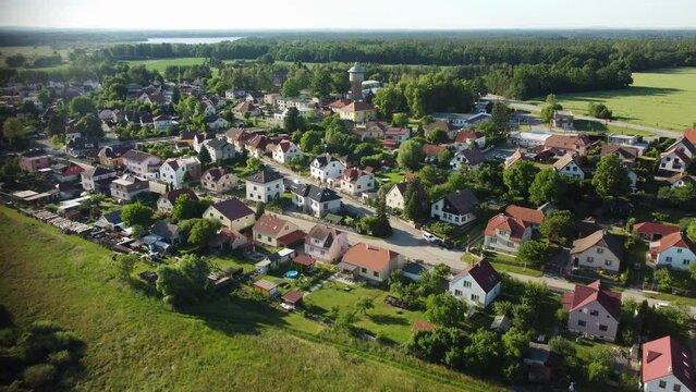 A water tower supplying water to a small town. Drone.