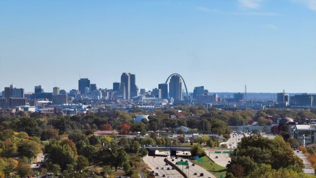 View of the downtown St. Louis city skyline and highway 40 in Fall on a beautiful day with a boom down towards the ground.