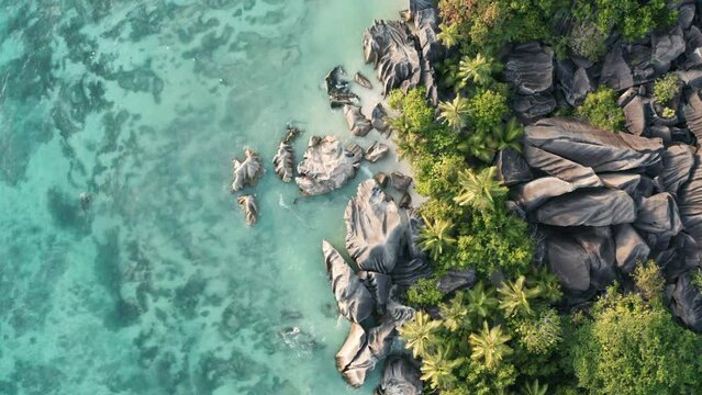 Top down drone view of famous rocks at Anse Source d'Argent beach, La Digue island, Seychelles
