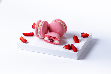 pink macaroon with strawberry flavor and jam filling