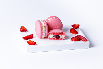 pink macaroon with strawberry flavor and jam filling