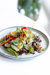 salad with vegetables on a white background