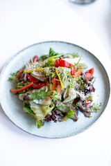 salad with vegetables on a white background