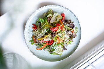 salad with vegetables on a white background