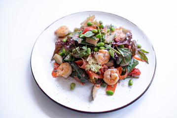 salad with shrimps on the white 