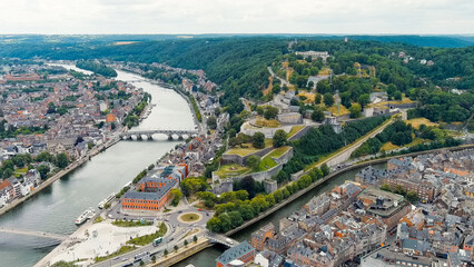 Fototapeta na wymiar Namur, Belgium. Citadelle de Namur - 10th-century fortress with a park, rebuilt several times. Panorama of the central part of the city. River Meuse. Summer day, Aerial View