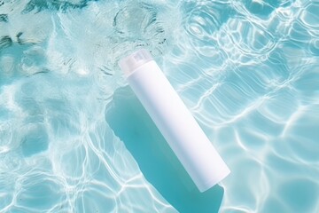White blank cosmetic bottle tube mock up lies on the water surface - obrazy, fototapety, plakaty