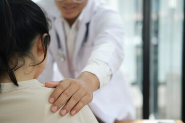 Doctor and patient. Kind doctor offering a loving gesture to a sick person during a health crisis.