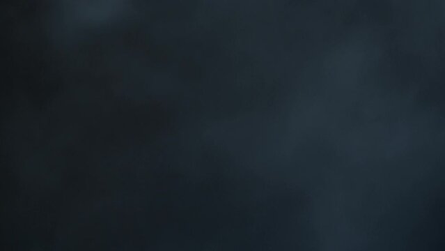 Cinematic spooky Halloween horror-show atmospheric thundercloud smoke VFX element. Layered VFX atmospheric clip. The 4K slow-motion atmosphere clip is tailored to your story. VFX thunder, cloud, smoke