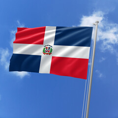 Dominican Republic flag fluttering in the wind on sky.