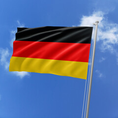 Germany flag fluttering in the wind on sky.