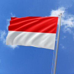Indonesia flag fluttering in the wind on sky.