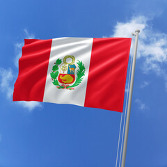 Naklejka premium Peru flag fluttering in the wind on sky.