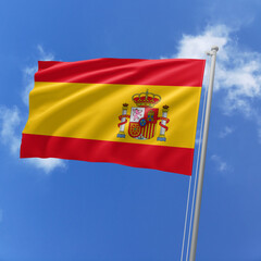 Spain flag fluttering in the wind on sky.