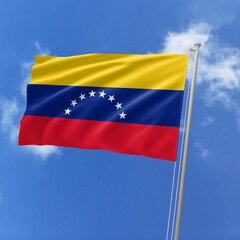Venezuela flag fluttering in the wind on sky.