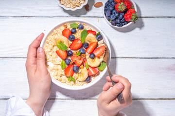 Sweet summer breakfast oatmeal with berry