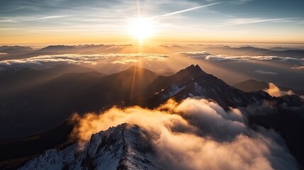 Sunset over the mountains in the clouds Beautiful winter landscape