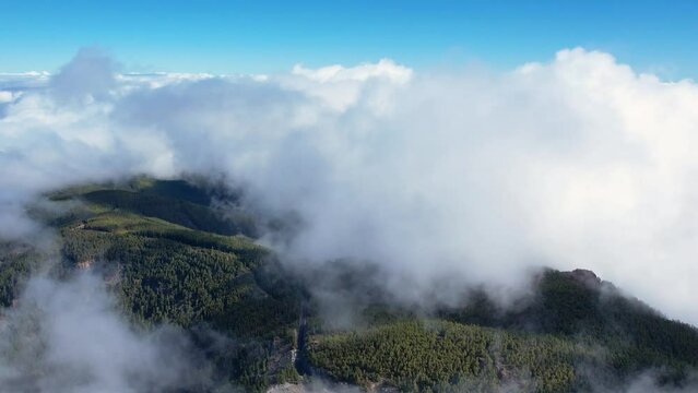 4K drone aerial shot of clouds, flying through the clouds above Tenerife landscape - Tenerife, Canary Islands