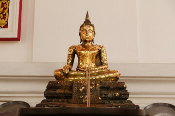 Buddha statue small of Wat Mongkol Bophit (Wihan Phra Mongkhon Bophit) at Ayutthaya in...