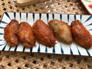 Dish of yummy New Orleans chicken wings.