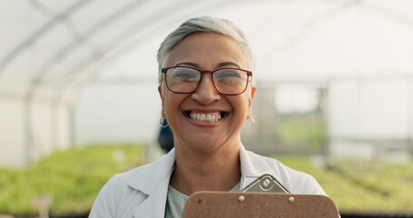 Portrait, botanist and happy woman at greenhouse for science at farm, plant and checklist for...