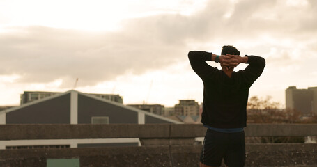 Man, runner and success view in city training victory, fitness progress or cloudy morning cardio....