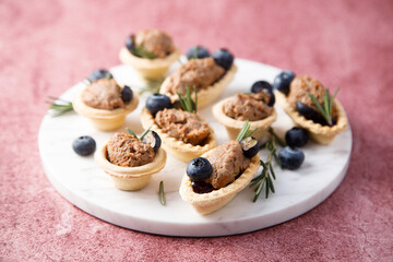 Homemade chicken liver pate with rosemary and blueberry