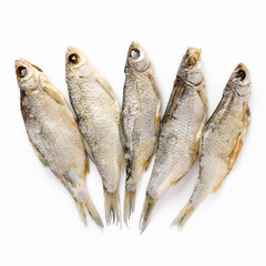 Dried salted fish jerked roach on isolated white background top view for your design. Healthy food. Protein, Vitamins, healthy fats for human health. Bio products. Food, homemade beer snack