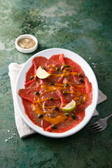 Homemade beef carpaccio with capers