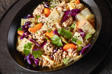 egg roll cabbage soup in bowl, top view