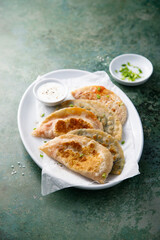 Traditional homemade flatbread with tomato and herbs