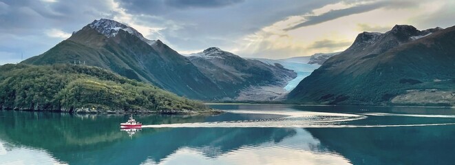 beautiful Norway  landscape at Halsa  at the edge of fjord with glacier Svartisen background and...