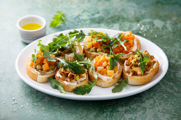 Healthy crostini with pumpkin and mushroom