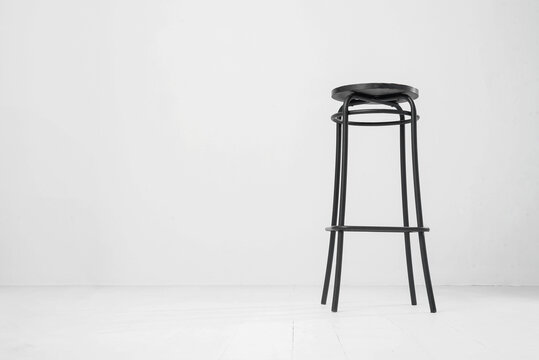 Black bar stool isolated on the white background.