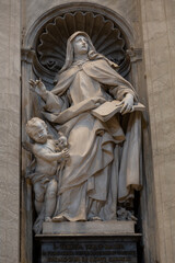 Sculpture of the catholic saint Teresa of the Child Jesus in the interior of St. Peter's Cathedral...