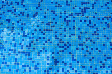 Fototapeta premium Swimming pool bottom with mosaic ceramic and rippled background