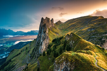 Sunset over majestic rocky mountain ridge of Saxer Lucke, Swiss Alps in autumn at Switzerland - Powered by Adobe