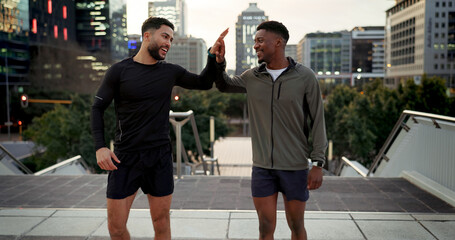 Friends, men and runner with high five outdoor for fitness, exercise or city training during...