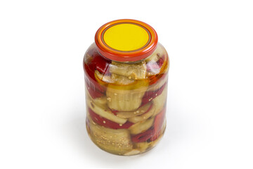 Canned pieces of eggplant with bell pepper in glass jar