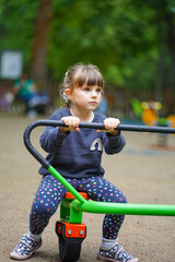 little child on the playground in varna bulgaria seagarden 