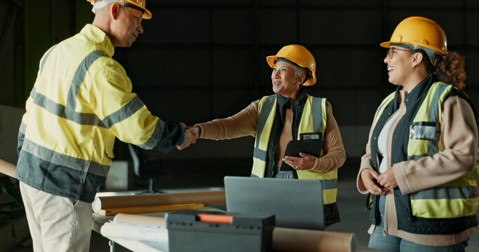 Engineering team, factory people and handshake for manufacturing agreement, construction deal or collaboration. Greeting, warehouse project and partner shaking hands for hello, welcome or thank you