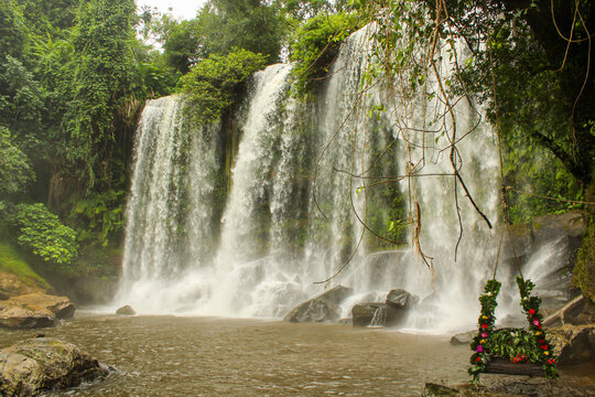 Swing at Kulen Mountain waterfall, It is the holly water