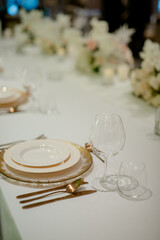 Flower decoration for celebrations. Decoration of tables and chairs. Rustic decoration.

