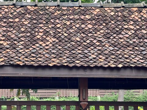 a roof of a house in the park.
