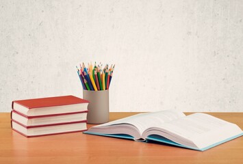 Study concept, school desk with stationery and books