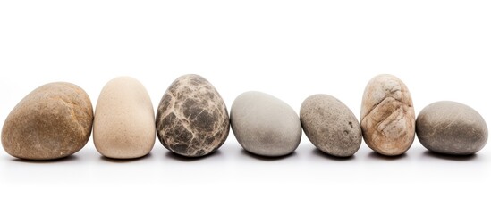 Round stones on a white background are separate