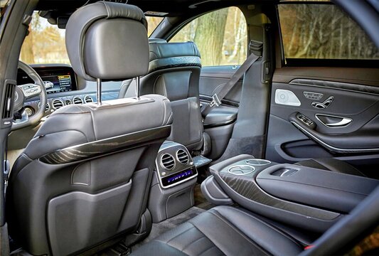 Modern car black leather interior background,  inside luxury city car photo