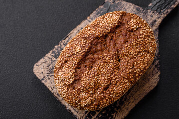 Delicious fresh crispy brown bread with seeds and grains