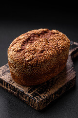 Delicious fresh crispy brown bread with seeds and grains