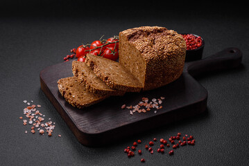Delicious fresh crispy brown bread with seeds and grains